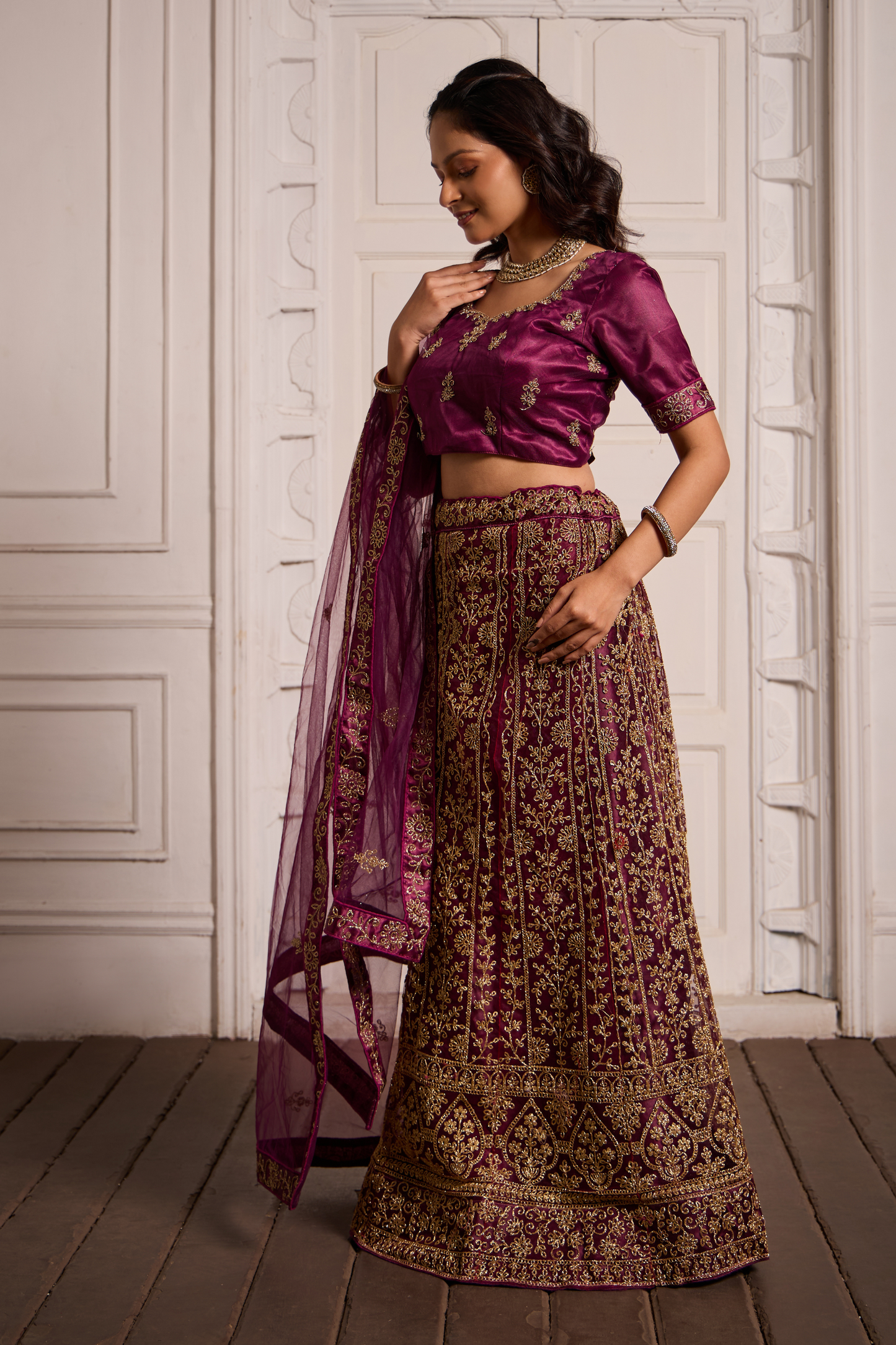 Oppulence Burgundy Colored Heavy Work Lehenga Choli