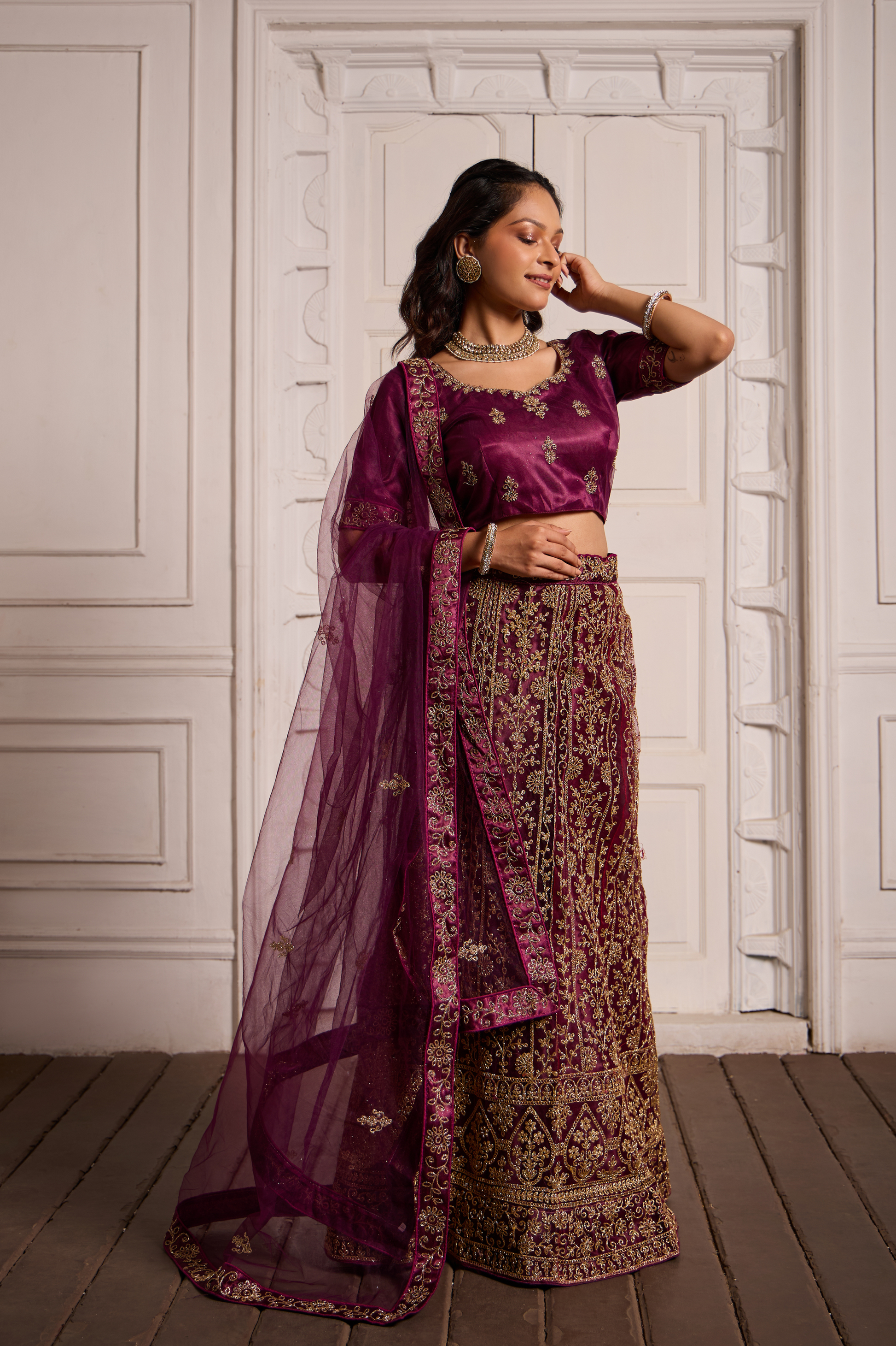 Oppulence Burgundy Colored Heavy Work Lehenga Choli