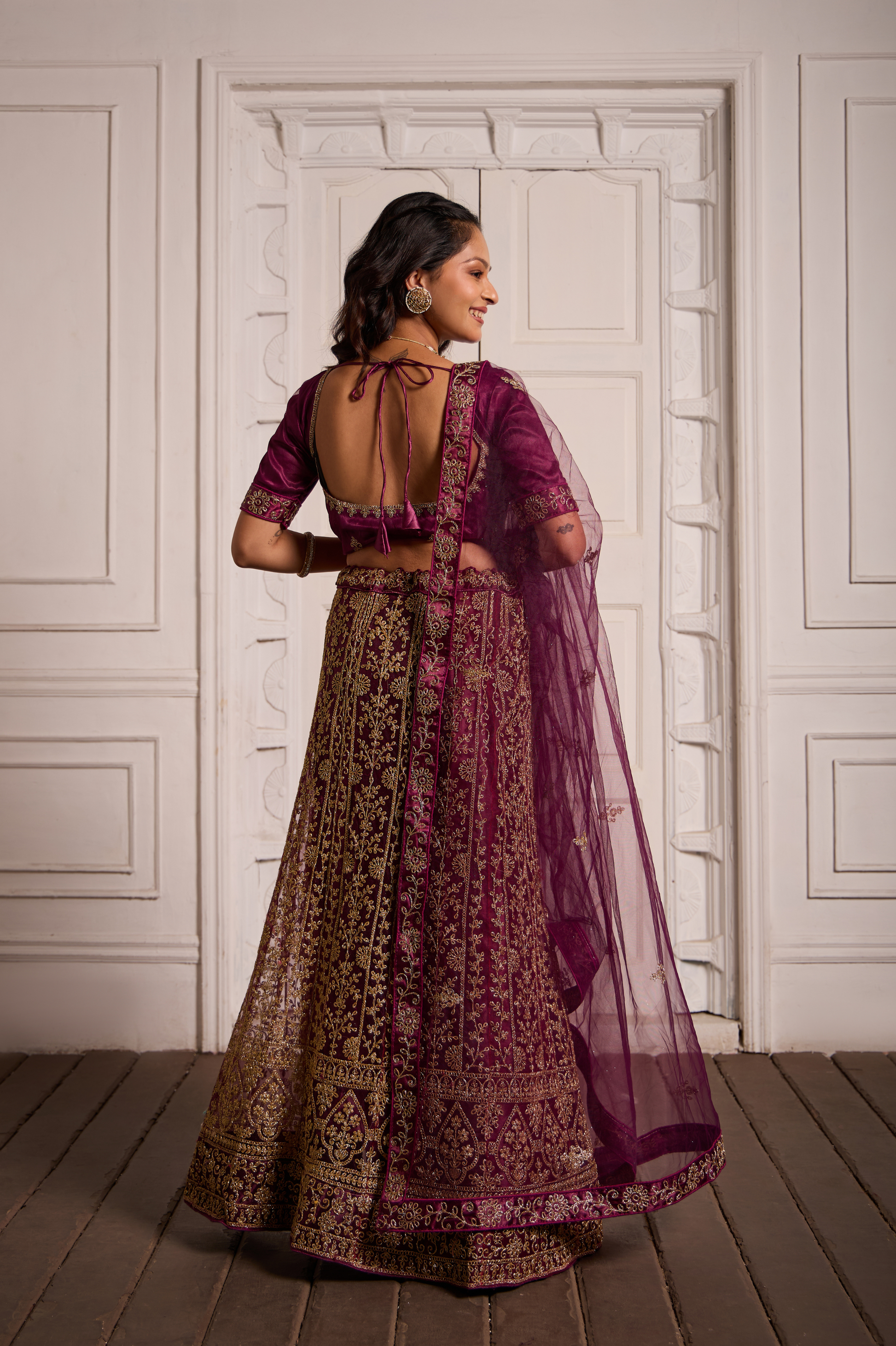 Oppulence Burgundy Colored Heavy Work Lehenga Choli